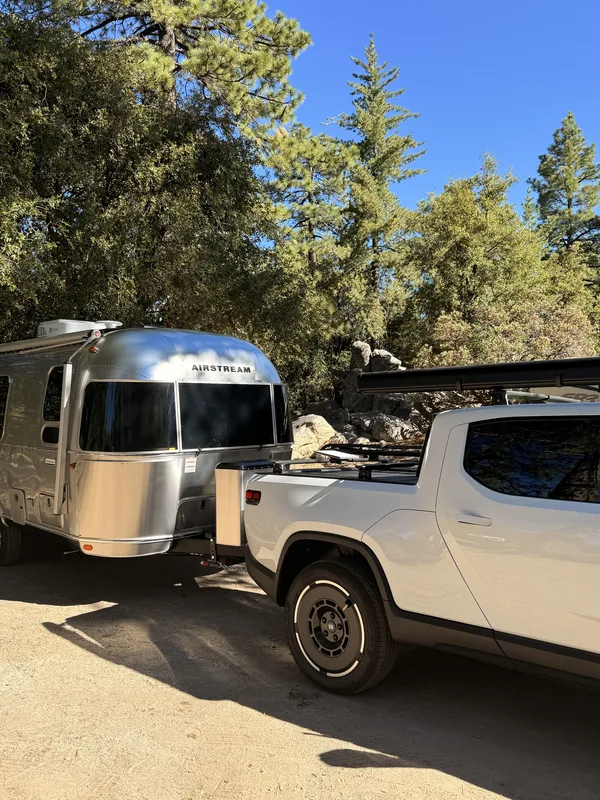 The 23-foot Airstream International parked under the pines at Pine Cove, California