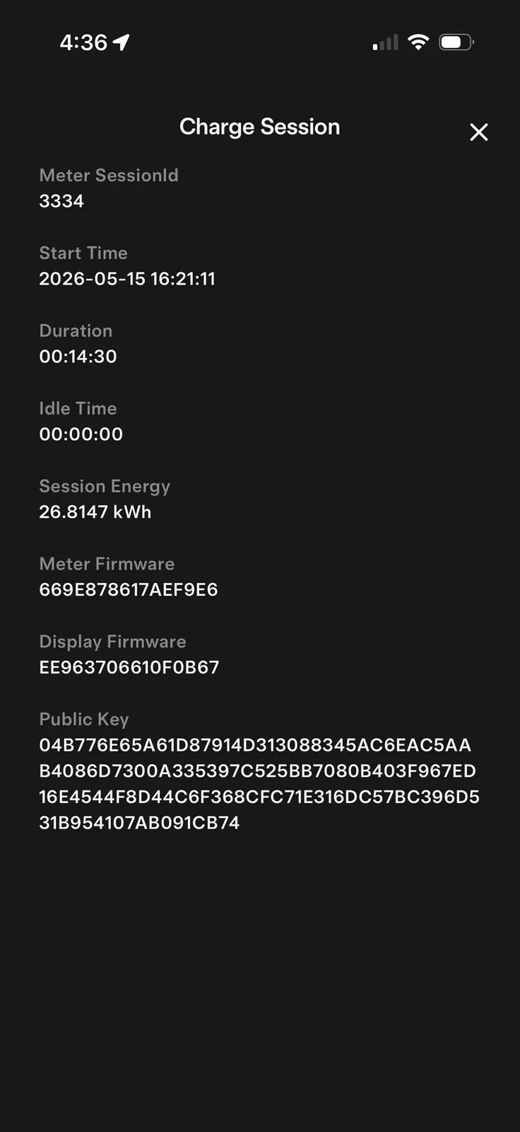 The Tesla app's detailed Charge Session view showing meter session ID 3334, a 2026-05-15 16:21:11 start time, 00:14:30 duration, 26.8147 kWh session energy, plus meter firmware, display firmware, and public key fingerprints