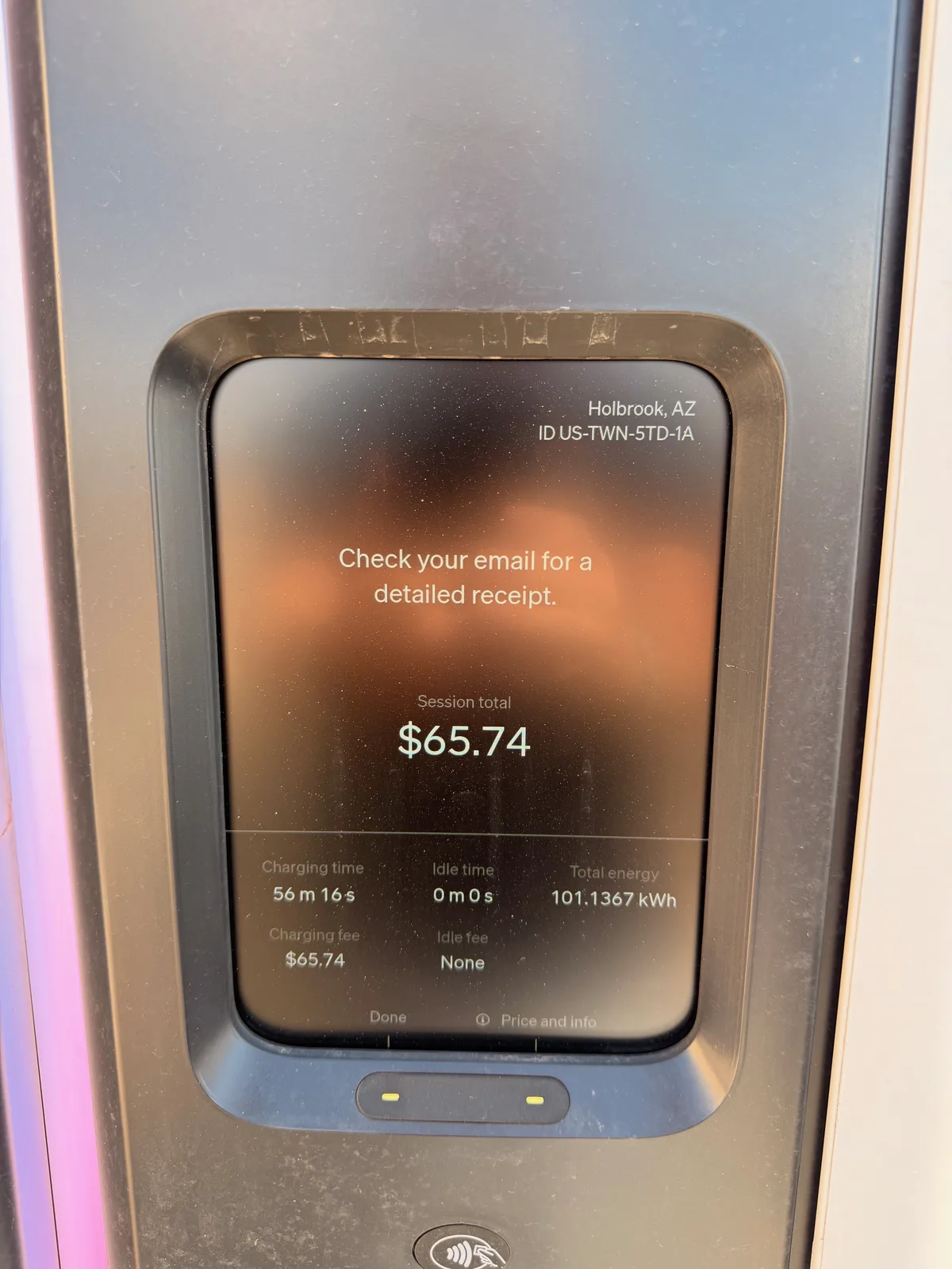 The Holbrook RAN pricing details screen showing Rivian rate $0.65 per kWh, other-vehicle rate $0.67 per kWh, idle fee $0.50 per minute with a 10 minute grace period, max power 300 kW DC, max current 500 A, serial ROP500N2522402108, software V04.06.02