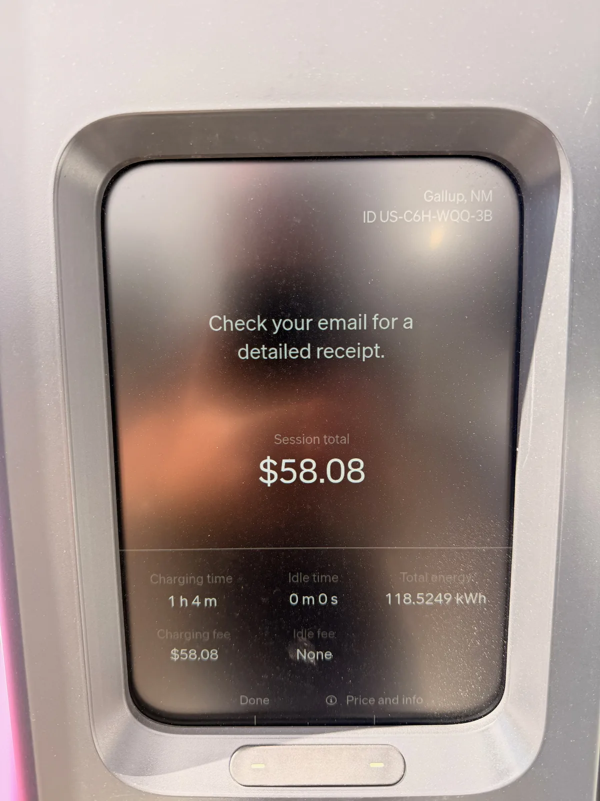 The Gallup RAN pedestal receipt screen showing 118.5249 kWh total energy delivered, $58.08 session total, charging time 1 h 4 m, zero idle, charger US-C6H-WQQ-3B in Gallup NM