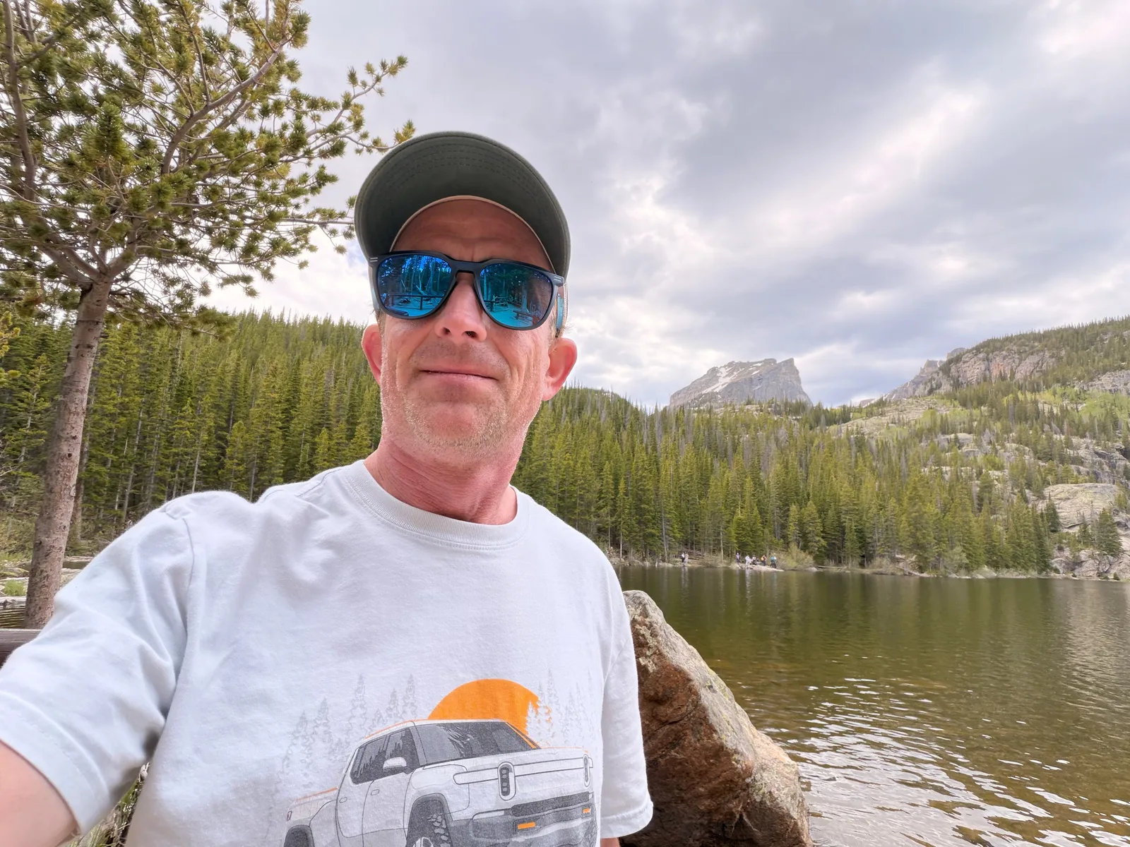 Rivian R1T center display on the Bear Lake Road at 12:56 PM showing elevation 9,696 ft, Trip B 20.5 mi at 24 mph, battery 94 F, motor temps 131 to 141 F, tires 48 psi front and 53 to 54 psi rear, ambient 80 F