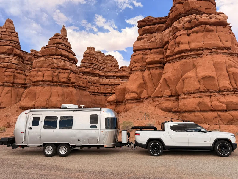The Rivian R1T and silver Airstream on the open road during the 6,000-mile round trip.