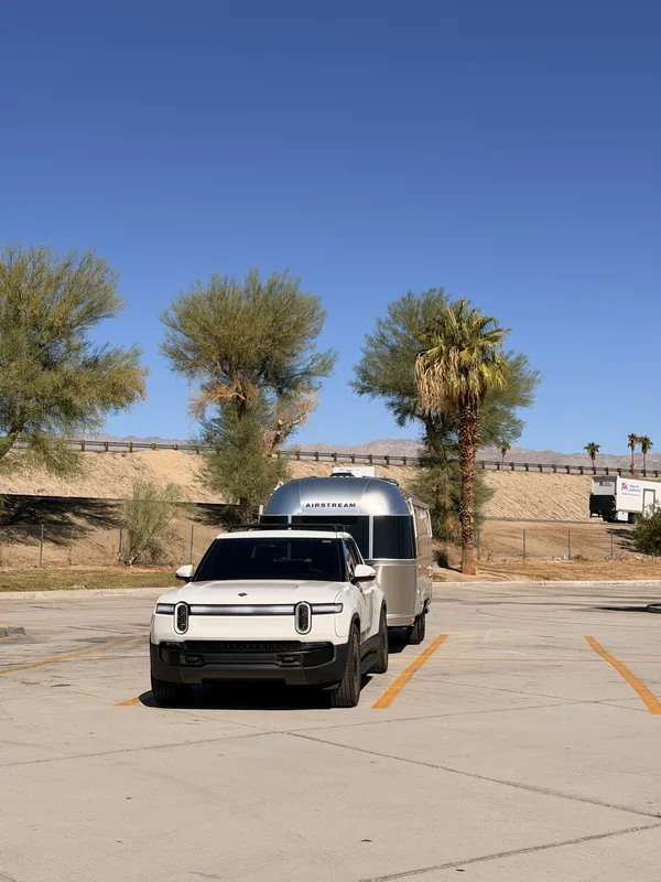 The 23-foot Airstream International hitched to the Rivian R1T at Coachella, California