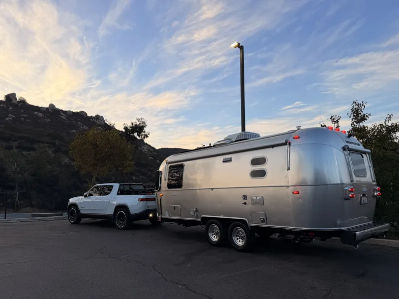 The 23-foot Airstream International hitched to the Rivian R1T at Crest, California
