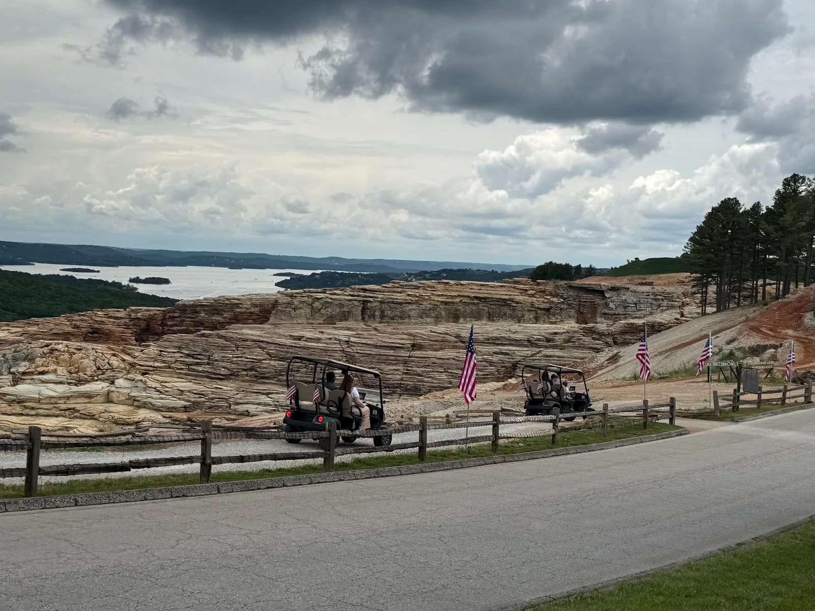 A stone overlook structure at Top of the Rock with the Ozark hills and Table Rock Lake spread out beyond