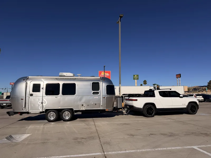 The Rivian R1T towing the 23-foot Airstream International near Barstow, California