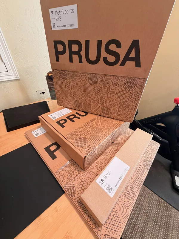 A Prusa parts box on the workbench at the start of the build